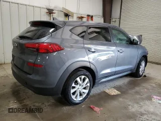 2019 Hyundai Tucson SE with VIN KM8J2CA43KU992708, listed as a Copart auction lot 57104054 with 0 mi miles and Non Repairable. Bid and sale history available at carsss.com. Image 3.