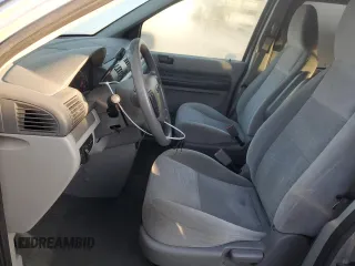 2005 Ford Freestar SE z VIN 2FMDA51635BA24020, wystawiony jako Copart lot #47605725 z przebiegiem 112 563 mil mil oraz Szkody całkowita. Historia ofert i sprzedaży dostępna na DreamBid. Obrazek 7.