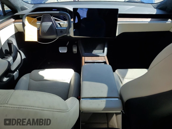 2023 Tesla Model S with VIN 5YJSA1E58PF531121, listed as a Copart auction lot 63683355 with Not provided miles and Salvage title. Bid and sale history available at DreamBid. Image 8.