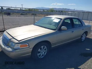 1999 Ford Crown Victoria z VIN 2FAFP73W7XX179492, wystawiony jako IAAI lot #42188954 z przebiegiem 137 299 mil mil oraz . Historia ofert i sprzedaży dostępna na DreamBid. Obrazek 2.