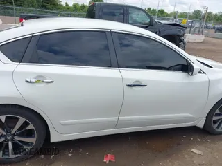 2016 Nissan Altima S z VIN 1N4AL3AP0GC174433, wystawiony jako IAAI lot #42257840 z przebiegiem 122 158 mil mil oraz . Historia ofert i sprzedaży dostępna na DreamBid. Obrazek 14.