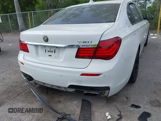 2013 BMW 7 Series 740i with VIN WBAYA6C52DD143862, listed as a IAAI auction lot 41859183 with 133,666 mi miles. Bid and sale history available at carsss.com. Image 6.