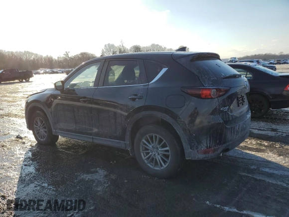 2017 Mazda CX-5 Touring with VIN JM3KFBCL0H0148970, listed as a Copart auction lot 42413605 with 57,776 mi miles and Salvage Title. Bid and sale history available at carsss.com. Image 2.