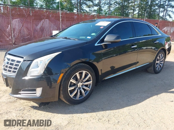 2013 Cadillac XTS Premium z VIN 2G61S5S34D9127996, wystawiony jako IAAI lot #41978539 z przebiegiem 185 157 mil mil oraz . Historia ofert i sprzedaży dostępna na DreamBid. Obrazek 2.