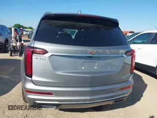 2025 Cadillac XT6 FWD Premium Luxury with VIN 1GYKPCRS3SZ118384, listed as a IAAI auction lot 41962391 with 6,946 mi miles. Bid and sale history available at carsss.com. Image 16.
