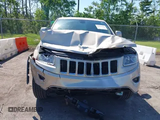 2014 Jeep Grand Cherokee Limited with VIN 1C4RJEBG4EC528934, listed as a IAAI auction lot 42033511 with 63,601 mi miles and . Bid and sale history available at DreamBid. Image 6.