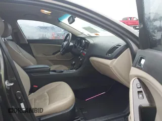 2013 Kia Optima EX z VIN 5XXGN4A79DG181719, wystawiony jako IAAI lot #42372478 z przebiegiem 166 410 mil mil oraz . Historia ofert i sprzedaży dostępna na DreamBid. Obrazek 5.