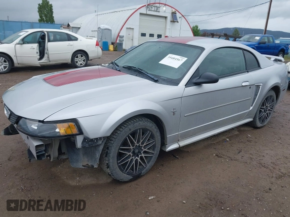 2003 Ford Mustang Standard with VIN 1FAFP40443F372464, listed as a IAAI auction lot 40085471 with 171,912 mi miles. Bid and sale history available at carsss.com. Image 2.