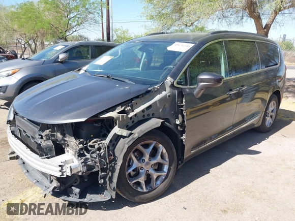 2017 Chrysler Pacifica Touring L with VIN 2C4RC1BG0HR826881, listed as a IAAI auction lot 42171240 with 214,188 mi miles and . Bid and sale history available at DreamBid. Image 17.