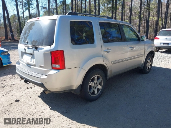 2010 Honda Pilot Touring with VIN 5FNYF4H91AB020868, listed as a IAAI auction lot 41783104 with 298,022 mi miles and . Bid and sale history available at carsss.com. Image 4.