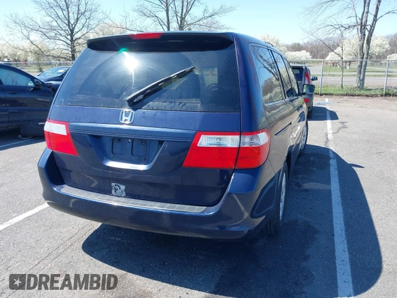 2007 Honda Odyssey LX with VIN 5FNRL38277B098798, listed as a IAAI auction lot 41998802 with 205,657 mi miles and . Bid and sale history available at carsss.com. Image 4.