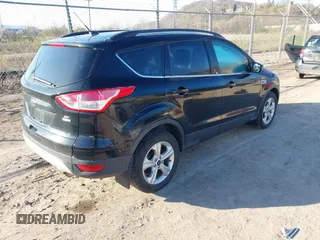 2016 Ford Escape SE with VIN 1FMCU9GX6GUB13846, listed as a IAAI auction lot 42051393 with 108,681 mi miles and . Bid and sale history available at DreamBid. Image 4.