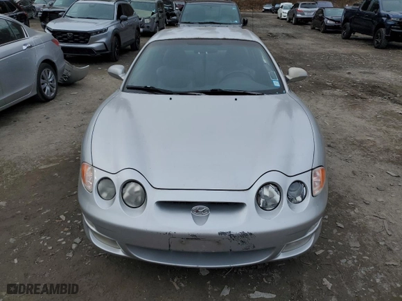 2001 Hyundai Tiburon with VIN KMHJG35F31U224416, listed as a Copart auction lot 83243684 with 59,473 mi miles and Salvage Title. Bid and sale history available at carsss.com. Image 5.