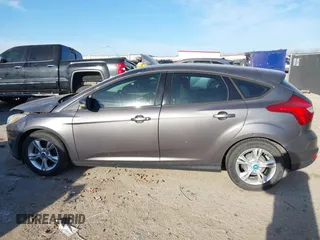 2013 Ford Focus SE with VIN 1FADP3K29DL220311, listed as a IAAI auction lot 41790487 with 136,257 mi miles. Bid and sale history available at carsss.com. Image 14.
