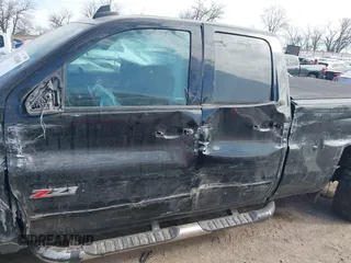 2016 Chevrolet Silverado 1500 LT with VIN 1GCVKREC2GZ345656, listed as a IAAI auction lot 41882885 with 145,820 mi miles. Bid and sale history available at carsss.com. Image 14.