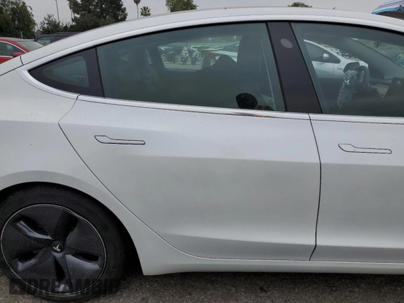 2020 Tesla Model 3 Standard Range Plus with VIN 5YJ3E1EA5LF747010, listed as a Copart auction lot 50937975 with Not Provided miles and Salvage Title. Bid and sale history available at DreamBid. Image 10.