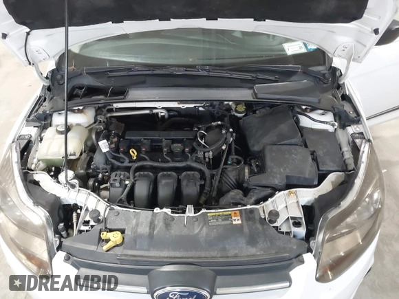 2012 Ford Focus S with VIN 1FAHP3E2XCL460821, listed as a IAAI auction lot 41877117 with 153,792 mi miles and . Bid and sale history available at DreamBid. Image 10.