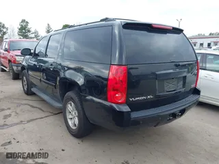 2013 GMC Yukon XL SLT with VIN 1GKS1KE00DR332987, listed as a IAAI auction lot 41512378 with 190,693 mi miles. Bid and sale history available at carsss.com. Image 3.