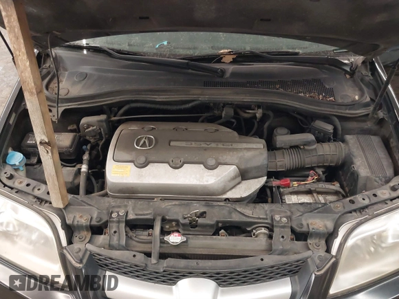 2004 Acura MDX with VIN 2HNYD18254H511752, listed as a IAAI auction lot 41387382 with 217,074 mi miles. Bid and sale history available at carsss.com. Image 10.