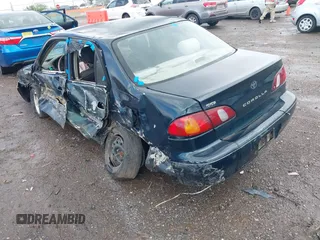 1999 Toyota Corolla VE z VIN 2T1BR12E9XC200873, wystawiony jako IAAI lot #42021029 z przebiegiem Nie podano mil oraz . Historia ofert i sprzedaży dostępna na DreamBid. Obrazek 3.