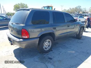 2001 Dodge Durango z VIN 1B4HR28Z11F613523, wystawiony jako IAAI lot #41703743 z przebiegiem 142 828 mil mil oraz . Historia ofert i sprzedaży dostępna na DreamBid. Obrazek 4.