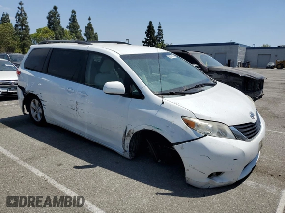 2014 Toyota Sienna LE AAS with VIN 5TDKK3DC8ES442280, listed as a Copart auction lot 59374985 with 207,563 mi miles and Salvage title. Bid and sale history available at DreamBid. Image 4.