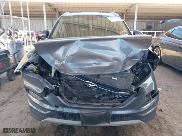 2017 Hyundai Tucson Value with VIN KM8J33A23HU472898, listed as a IAAI auction lot 41634205 with 81,690 mi miles. Bid and sale history available at carsss.com. Image 13.