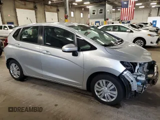 2015 Honda Fit LX with VIN 3HGGK5H55FM711979, listed as a Copart auction lot 62756625 with 79,345 mi miles and Salvage title. Bid and sale history available at DreamBid. Image 4.