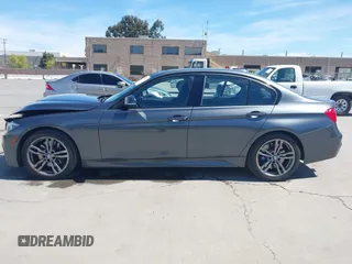 2015 BMW 3 Series 328i with VIN WBA3C1C5XFP116871, listed as a IAAI auction lot 41977362 with 205,772 mi miles and . Bid and sale history available at carsss.com. Image 14.