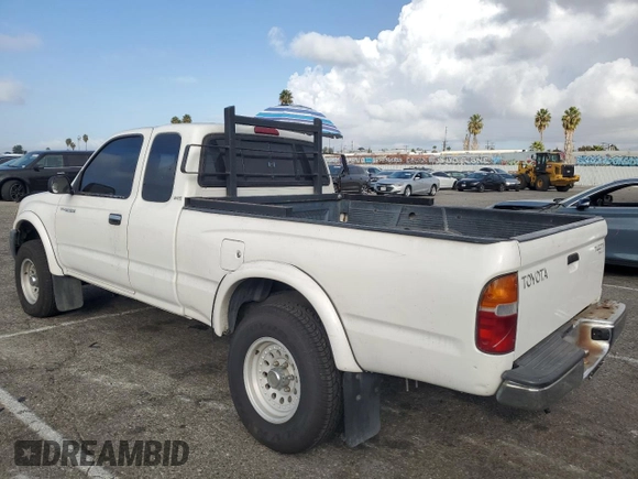 1999 Toyota Tacoma PreRunner with VIN 4TASM92NXXZ476400, listed as a Copart auction lot 81001204 with 280,797 mi miles and Salvage title. Bid and sale history available at DreamBid. Image 2.