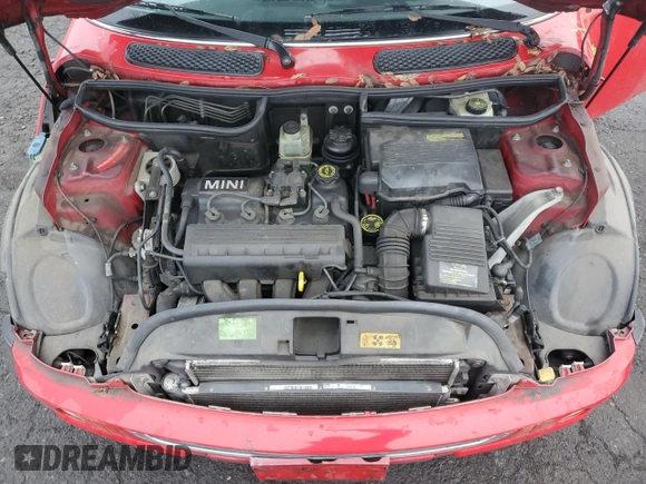 2003 MINI Hardtop z VIN WMWRC33413TC45360, wystawiony jako Copart lot #82666434 z przebiegiem 123 226 mil mil oraz Szkoda całkowita • Salvage title. Historia ofert i sprzedaży dostępna na DreamBid. Obrazek 11.