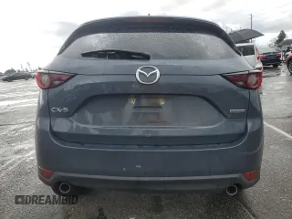 2021 Mazda CX-5 Touring with VIN JM3KFACM3M0420425, listed as a Copart auction lot 47993745 with 56,184 mi miles and Salvage Title. Bid and sale history available at carsss.com. Image 6.
