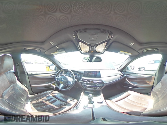 2018 BMW 5 Series 540i with VIN WBAJE5C51JWA94673, listed as a Copart auction lot 59807825 with 77,051 mi miles and Salvage title. Bid and sale history available at DreamBid. Image 14.