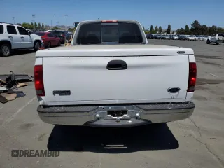 2000 Ford F-150 XL with VIN 1FTRX17W9YKA49152, listed as a Copart auction lot 60577505 with Not provided miles and Salvage title. Bid and sale history available at DreamBid. Image 6.