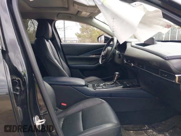 2021 Mazda CX-30 Preferred z VIN 3MVDMBCL5MM205824, wystawiony jako IAAI lot #41991942 z przebiegiem 58 112 mil mil oraz . Historia ofert i sprzedaży dostępna na DreamBid. Obrazek 5.