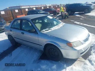 2002 Mazda Protege DX with VIN JM1BJ225321588015, listed as a IAAI auction lot 41409015 with 170,815 mi miles and . Bid and sale history available at DreamBid. Image 1.