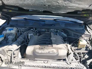 2013 Volkswagen Touareg Lux with VIN WVGEF9BP6DD004454, listed as a IAAI auction lot 41862958 with 239,548 mi miles and . Bid and sale history available at DreamBid. Image 10.