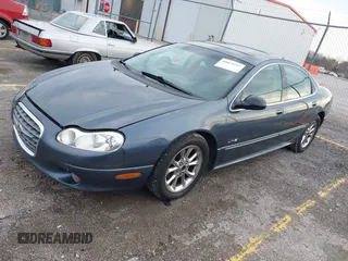 2001 Chrysler LHS z VIN 2C3HC56G01H562025, wystawiony jako IAAI lot #40875197 z przebiegiem 282 882 mil mil oraz . Historia ofert i sprzedaży dostępna na DreamBid. Obrazek 2.