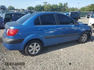 2009 Kia Rio LX with VIN KNADE223296515613, listed as a Copart auction lot 62008194 with 143,238 mi miles and Salvage Title. Bid and sale history available at carsss.com. Image 3.
