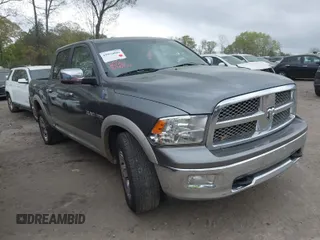 2010 Dodge 1500 Laramie with VIN 1D7RV1CT6AS119686, listed as a IAAI auction lot 41956006 with 306,952 mi miles and . Bid and sale history available at DreamBid. Image 1.