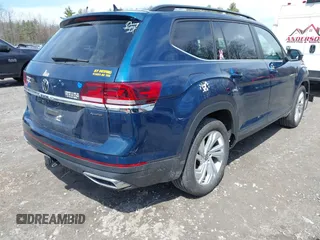 2023 Volkswagen Atlas SE with VIN 1V2HR2CA2PC505456, listed as a IAAI auction lot 42032269 with 7,918 mi miles and . Bid and sale history available at DreamBid. Image 4.