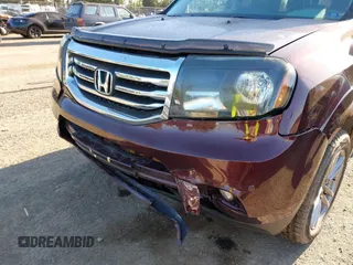 2014 Honda Pilot Touring with VIN 5FNYF4H93EB502117, listed as a IAAI auction lot 42086774 with 111,003 mi miles and . Bid and sale history available at carsss.com. Image 6.