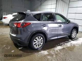 2014 Mazda CX-5 Touring with VIN JM3KE4CY6E0421738, listed as a Copart auction lot 45888885 with 103,693 mi miles and Salvage Title. Bid and sale history available at carsss.com. Image 3.