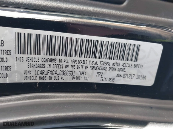 2018 Jeep Grand Cherokee Laredo E with VIN 1C4RJFAG4JC326631, listed as a IAAI auction lot 41191061 with 115,451 mi miles. Bid and sale history available at carsss.com. Image 9.