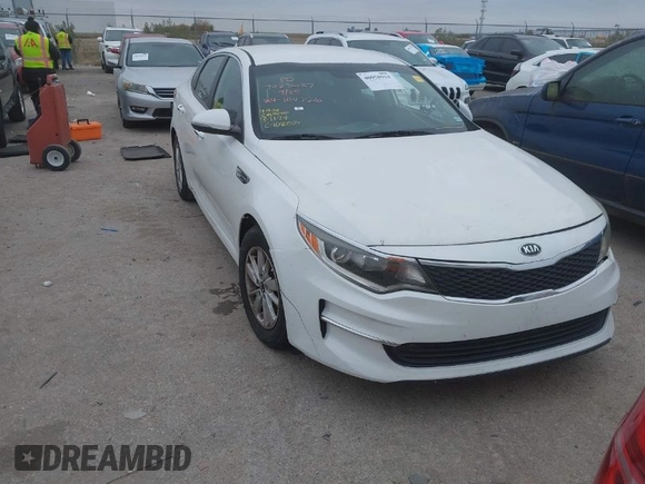 2016 Kia Optima LX with VIN KNAGT4L39G5104726, listed as a IAAI auction lot 40950914 with 128,728 mi miles. Bid and sale history available at carsss.com. Image 1.