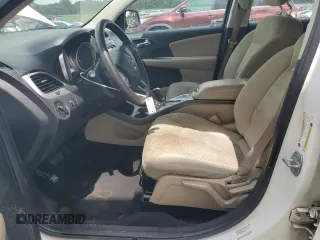 2014 Dodge Journey American Value with VIN 3C4PDCAB3ET216889, listed as a Copart auction lot 60874265 with 117,508 mi miles and Salvage title. Bid and sale history available at DreamBid. Image 7.