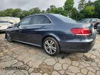 2014 Mercedes-Benz E 350 Sport with VIN WDDHF5KBXEA872156, listed as a Copart auction lot 60892695 with 166,555 mi miles and Salvage title. Bid and sale history available at DreamBid. Image 2.