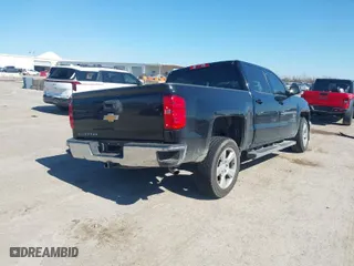 2014 Chevrolet Silverado 1500 LT with VIN 3GCPCREC1EG245728, listed as a IAAI auction lot 41663702 with 129,989 mi miles. Bid and sale history available at carsss.com. Image 4.