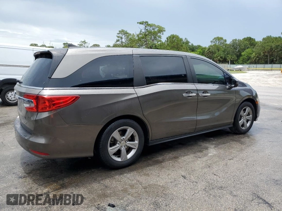 2018 Honda Odyssey EX with VIN 5FNRL6H5XJB017330, listed as a Copart auction lot 63470395 with 121,827 mi miles and Salvage title. Bid and sale history available at DreamBid. Image 3.