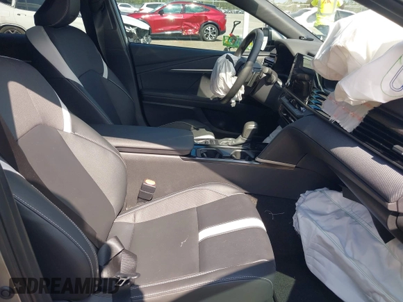 2025 Toyota Camry LE with VIN 4T1DAACK5SU539156, listed as a IAAI auction lot 42054268 with 5,705 mi miles and . Bid and sale history available at DreamBid. Image 5.
